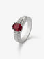 Anillo de oro blanco de 18K con rubí en talla oval de 1,029 cts y 40 diamantes en talla brillante con un total de 0,3 cts