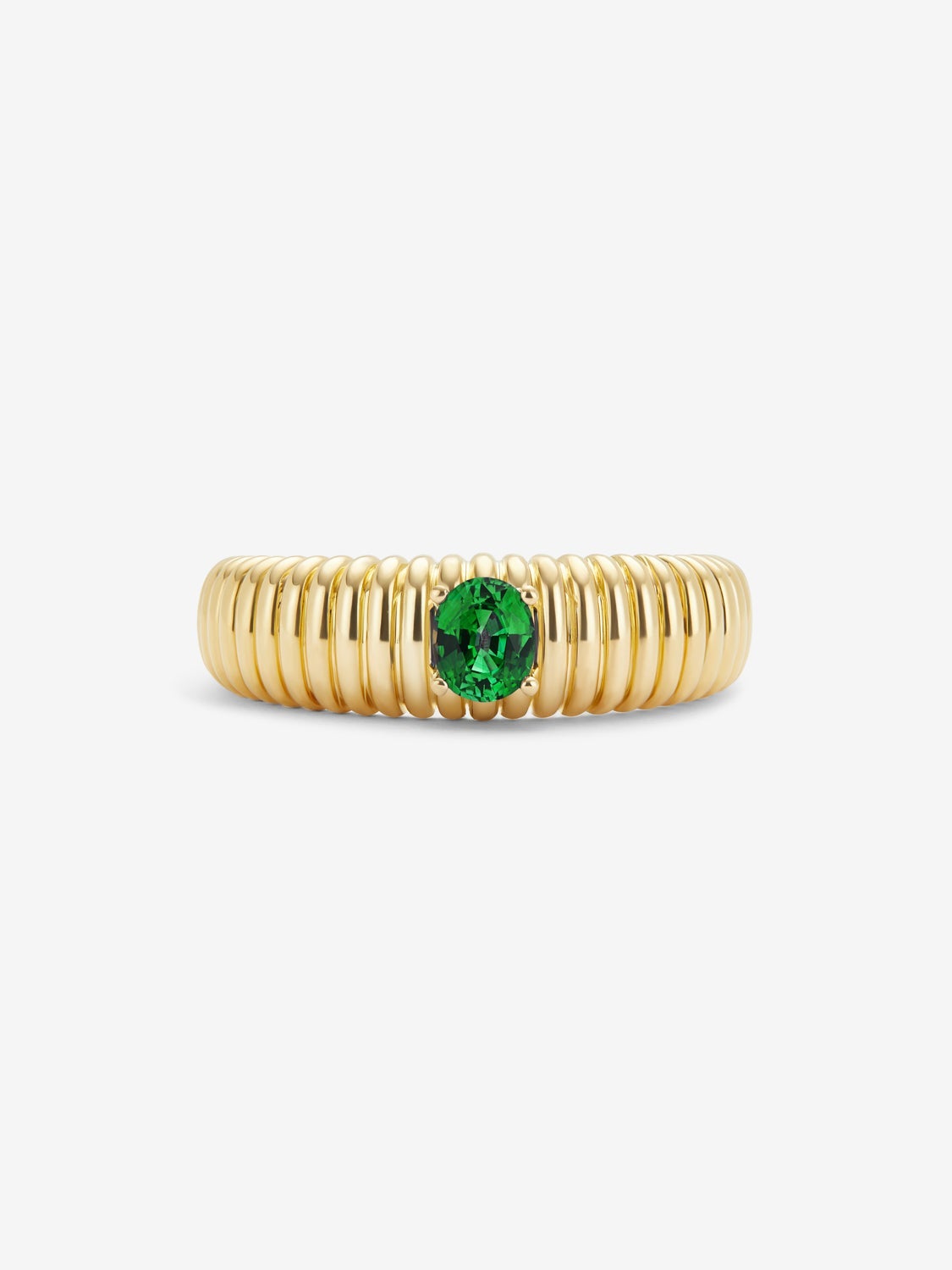 Anillo gallonado de oro amarillo de 18K con esmeralda verde en talla oval