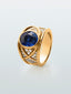 Anillo de oro amarillo de 18K con zafiro azul vivid en talla oval de 4,6 cts y 40 diamantes en talla brillante con un total de 0,5 cts