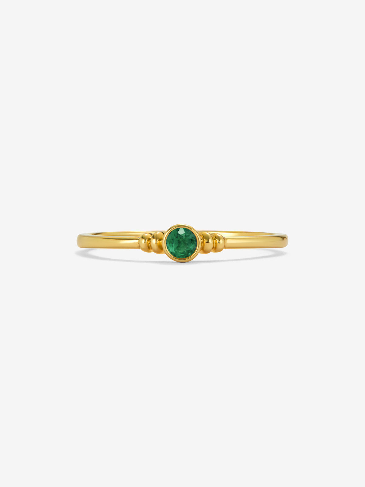 Anillo de oro amarillo de 18K con esmeralda en talla brillante de 0,12 cts