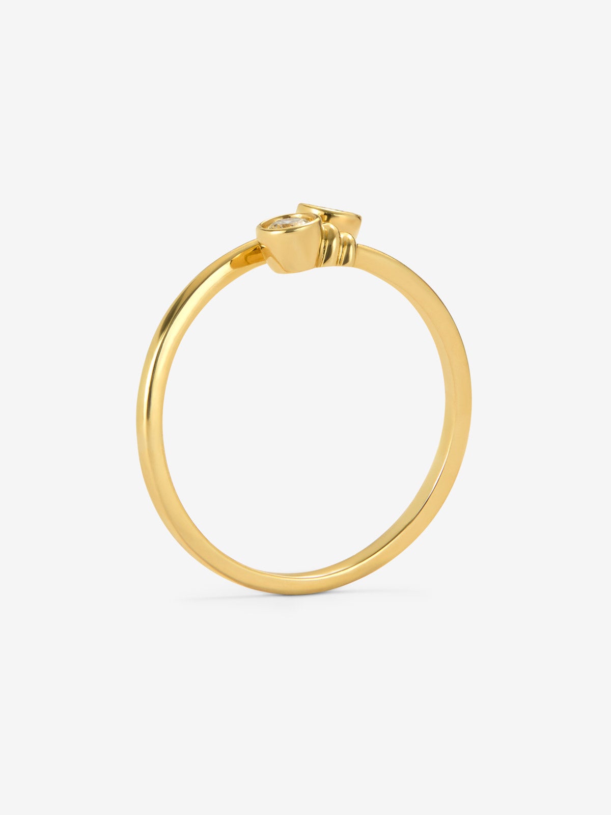 Anillo Tú y Yo de oro amarillo de 18K con dos diamantes en tlla brillante con un total de 0,14 cts