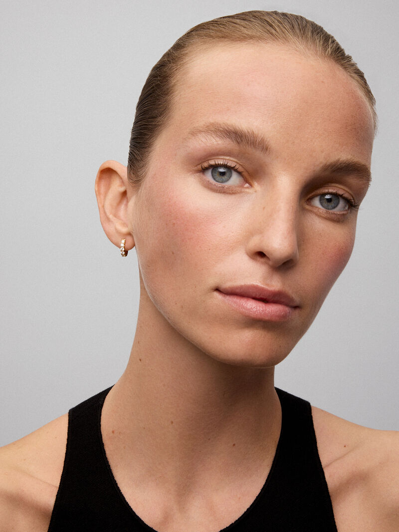 18K yellow gold hoop earrings with 12 brilliant-cut diamonds with a total of 0.65 cts image number 1
