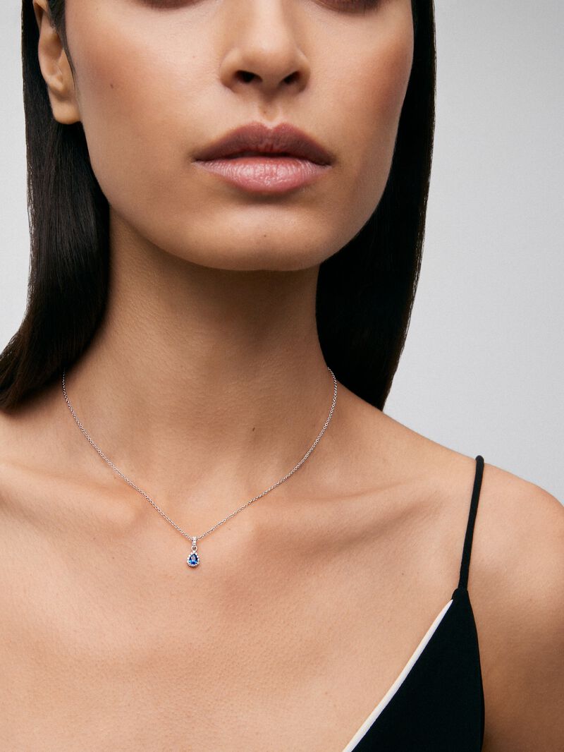 18K white gold pendant with blue zafiro in 0.4 cts and white diamonds in bright 0.08 cts image number 1
