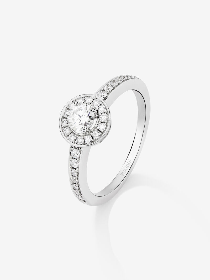 18K white gold solitaire engagement ring with a halo of diamonds image number 0