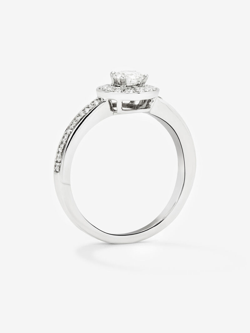 18K white gold solitaire engagement ring with a halo of diamonds image number 4