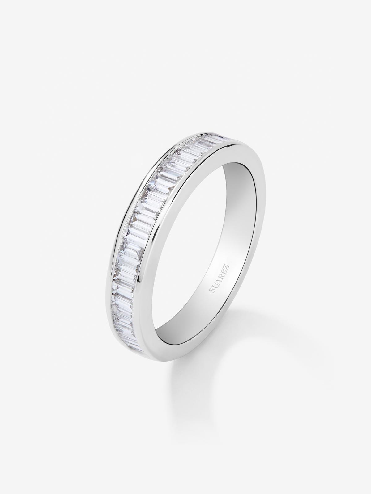 Half band ring in 18K white gold with half-circle of baguette-cut diamonds totaling 0.63 cts