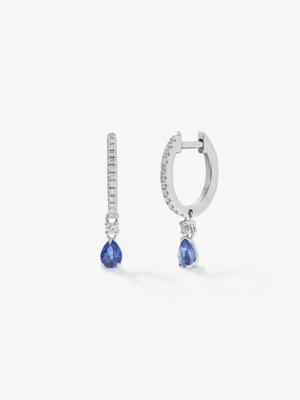 18K white gold hoop earrings with 2 pear-cut blue sapphires with a total of 0.59 cts and 28 brilliant-cut diamonds with a total of 0.17 cts