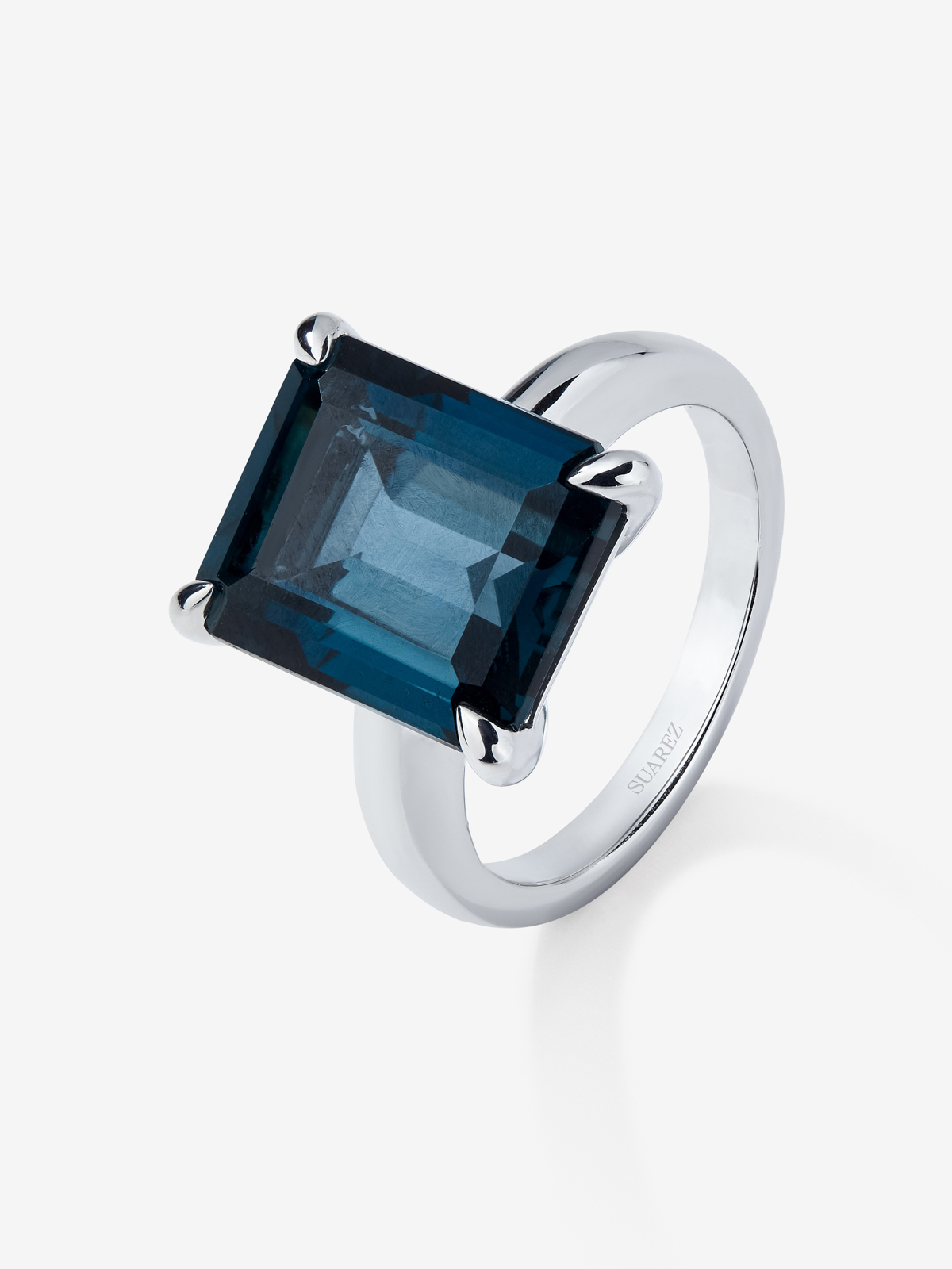 Silver ring with London blue topaz stone