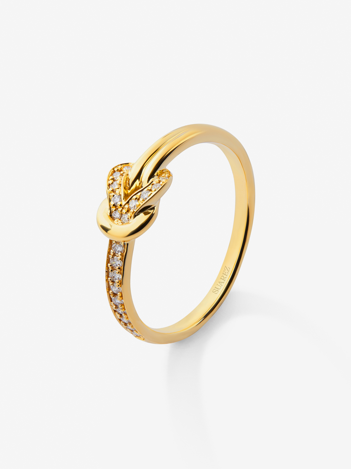 18K yellow gold ring with 15 brilliant-cut diamonds with a total of 0.09 cts and a knot shape