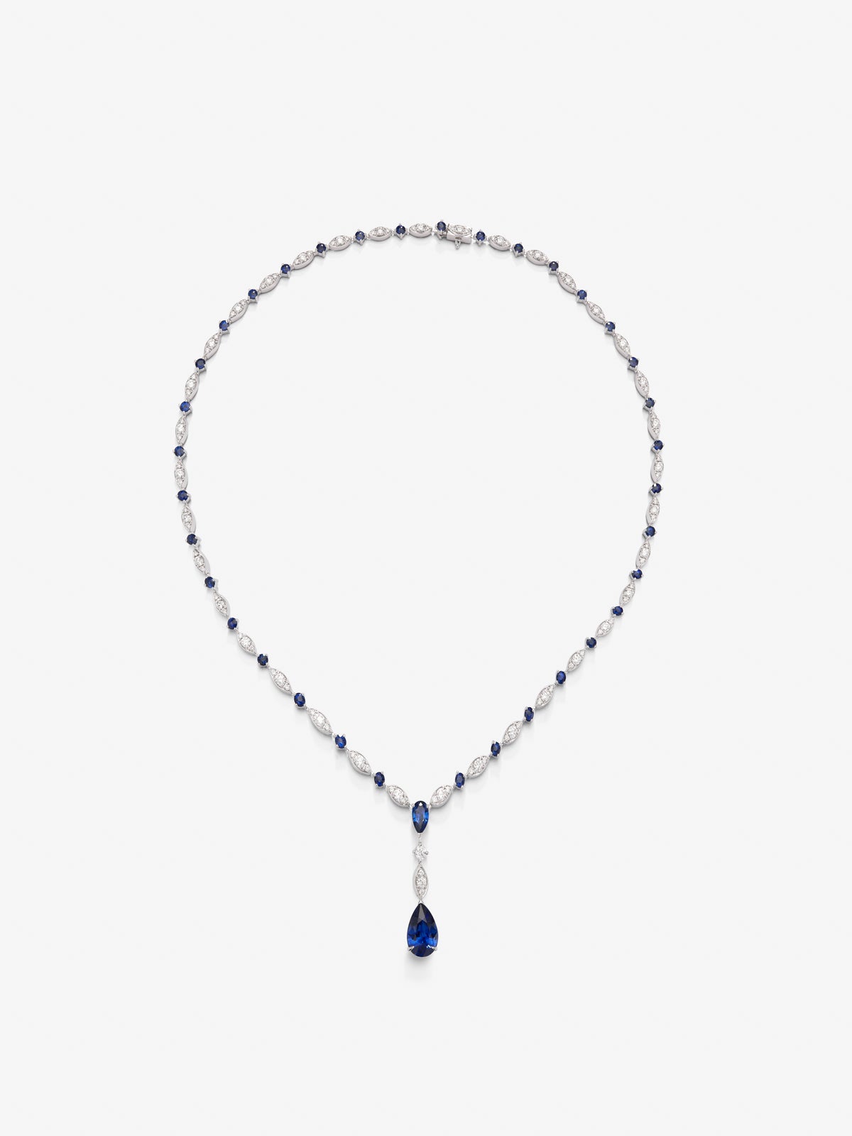 18K white gold necklace with Royal blue sapphire in pear size of 3.56, blue and bright blue slopes of 4.6 cts and white diamonds in bright size of 3.15 cts