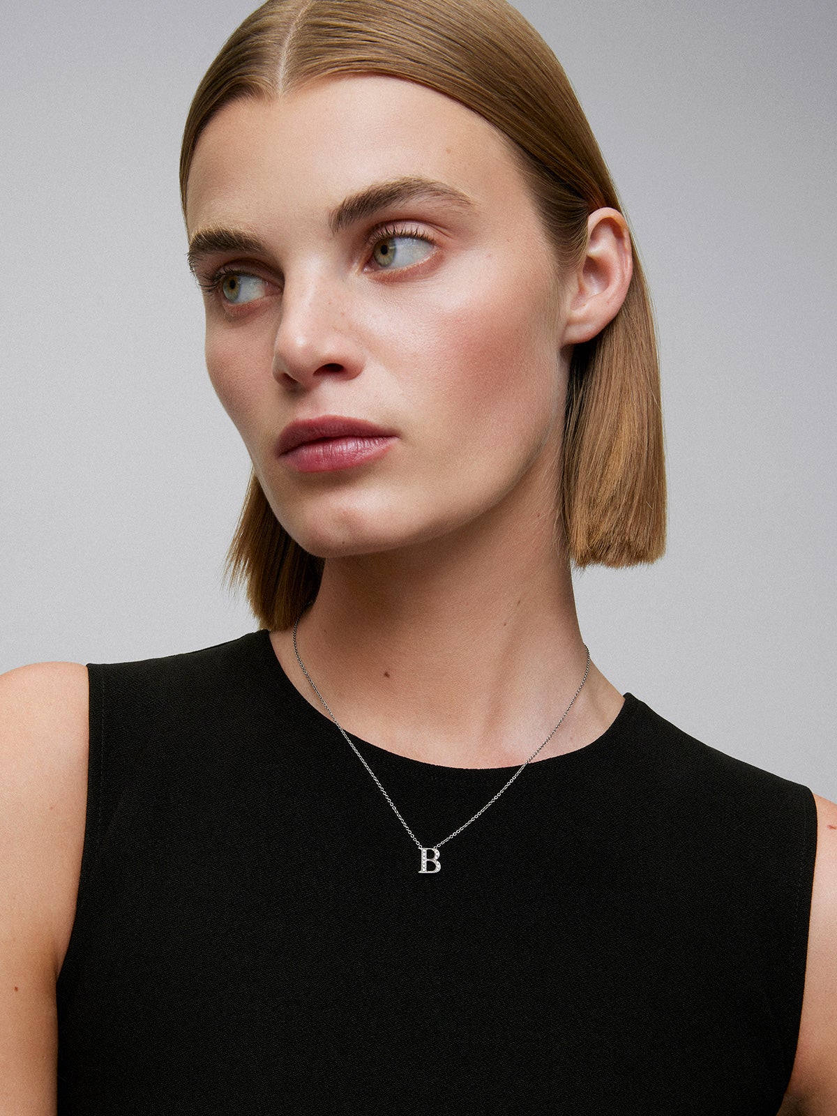 Pendant necklace with 18K white gold initial and diamonds